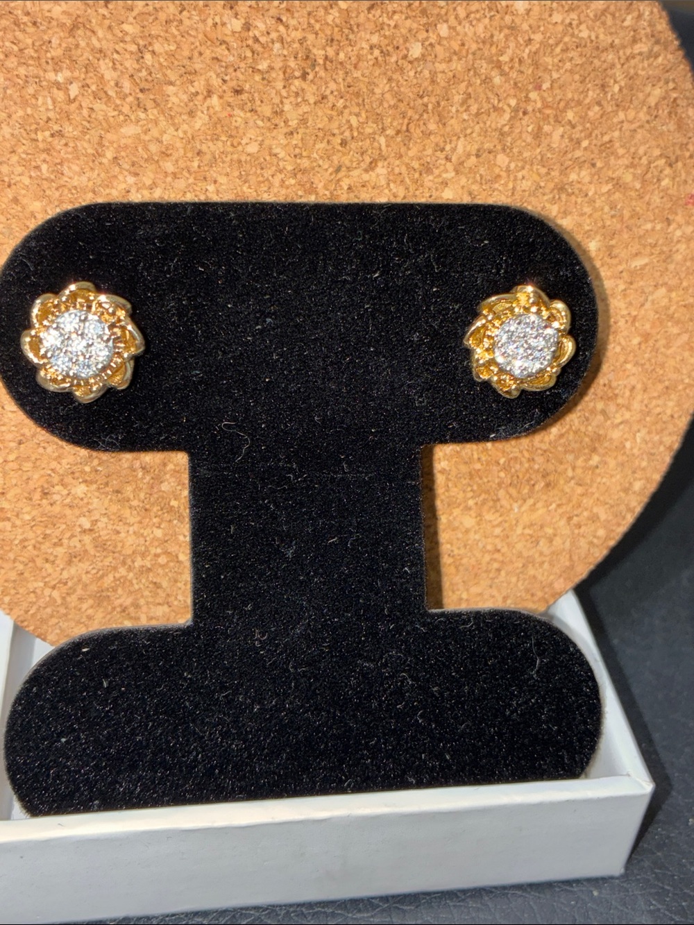 Moissanite stud earrings, 14 KG over silver.  I.15 carats